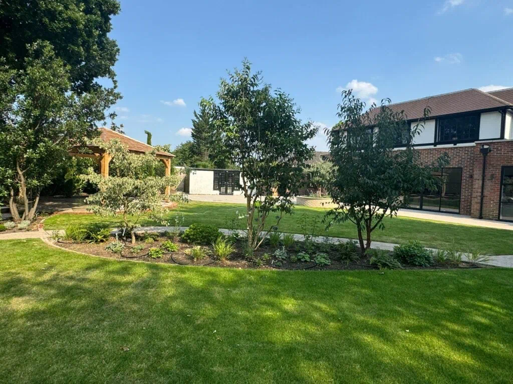 One of the pod beds in full glory with its trees and planting